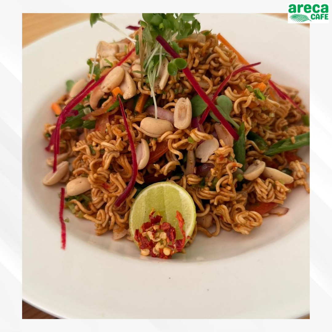 Spicy noodle dish with peanuts and lime